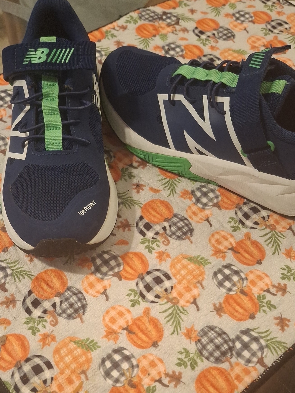 New Balance Kids Navy with Green Accent Athletic Sneakers